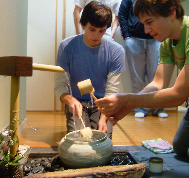 Tea ceremony `1-034 KCP students cleansing ritual before tea ceremony