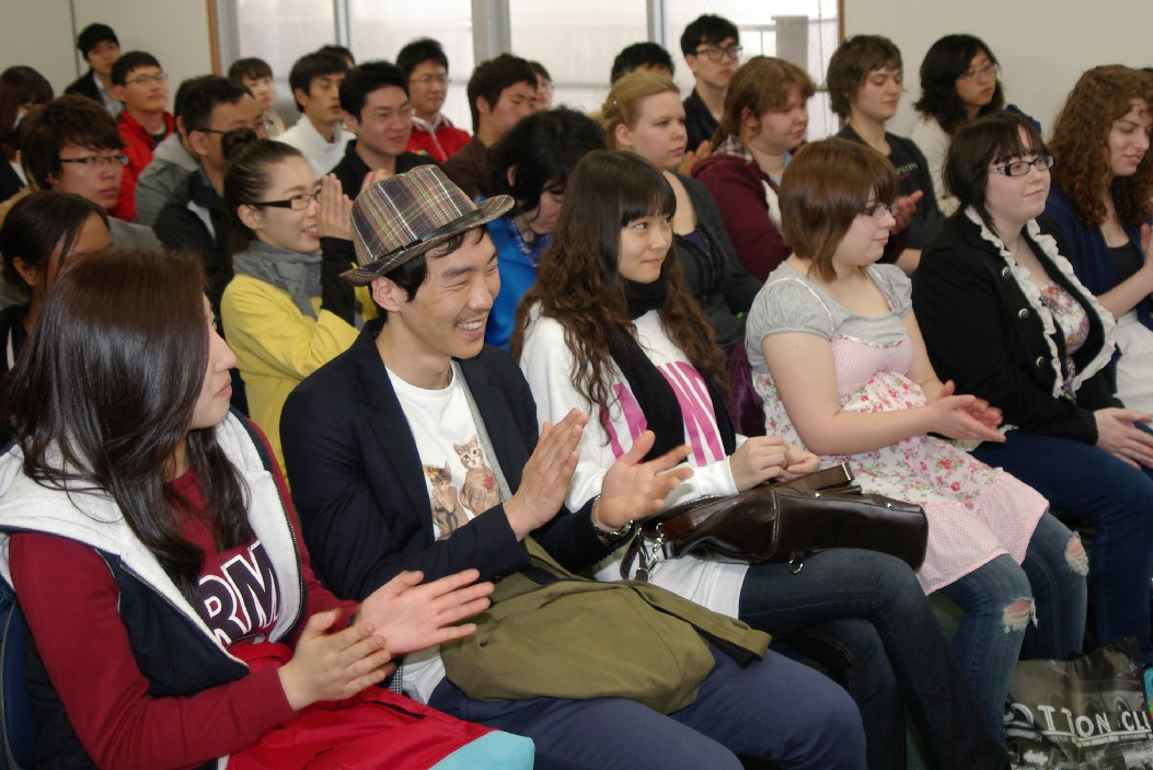 2 The students applauding
