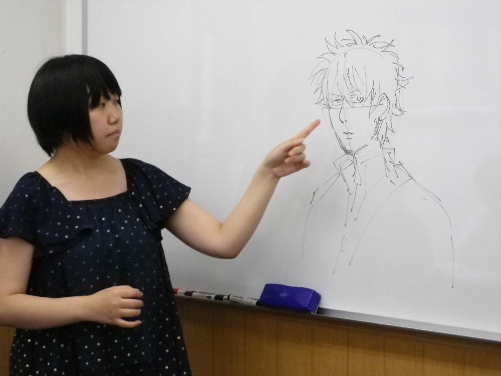 Lecturer teaches the basics of drawing a manga character