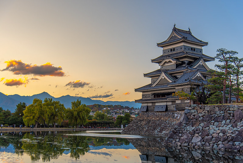 Golden lights sunset reflection scenery at Matsumoto castle