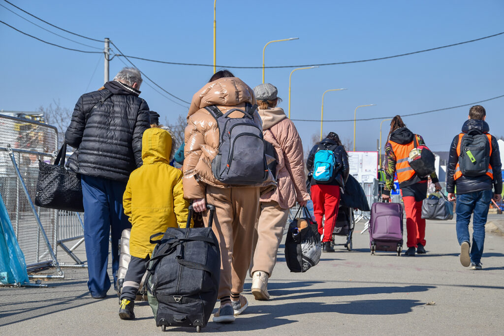 Refugees from Ukraine on the border with Slovakia. Women and children are fleeing the war in Ukraine. Volunteers on the Slovakia-Ukraine border are helping refugees.